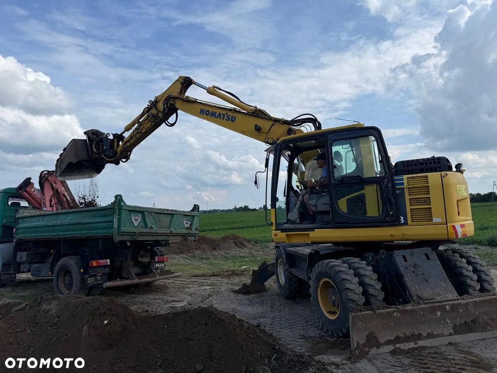 Komatsu Koparka kołowa Komatsu PW 148 Pług podpory Klima Centralne smarowanie Rototil Ramię 2 razy łamane PIĘKNA - 10