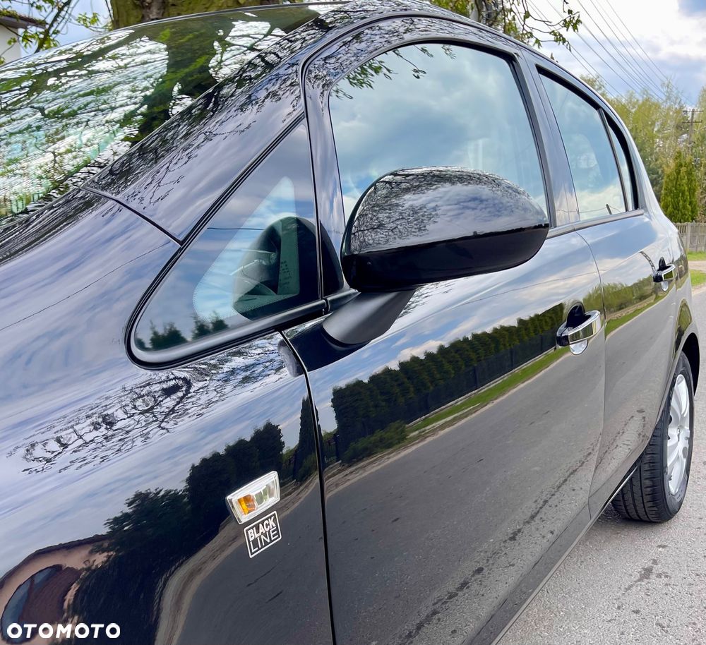 Opel Corsa 1.2 16V Cosmo - 29