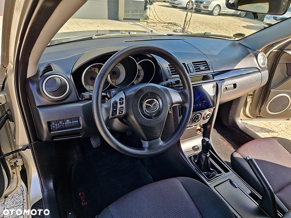 Mazda 3 1.6 Exclusive - 4