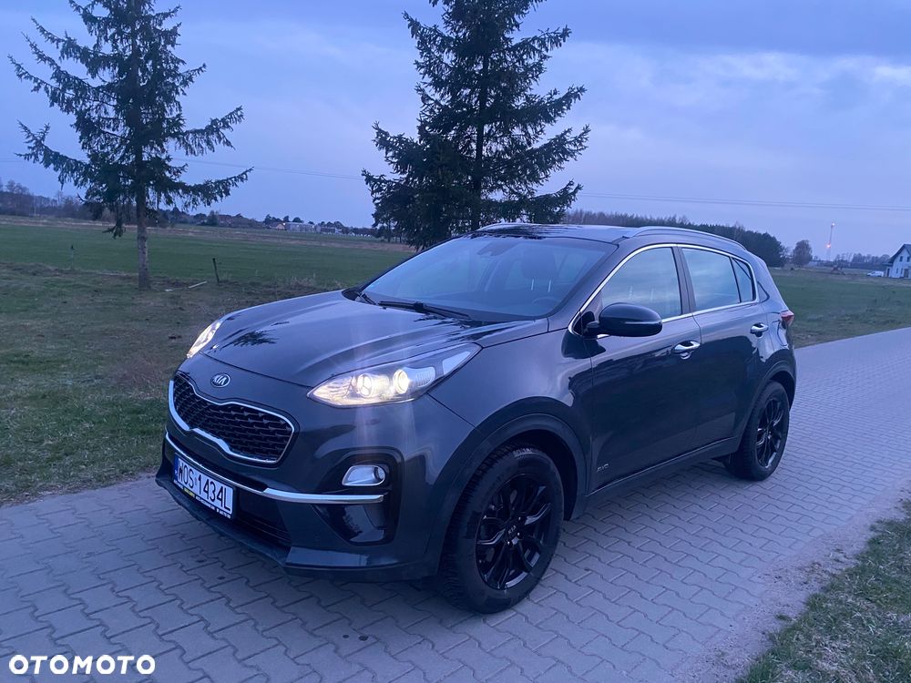 Kia Sportage 1.6 T-GDI AWD DCT PLATINUM - 1