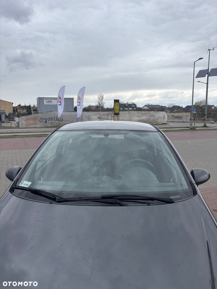 Opel Corsa 1.2 16V Cosmo - 8