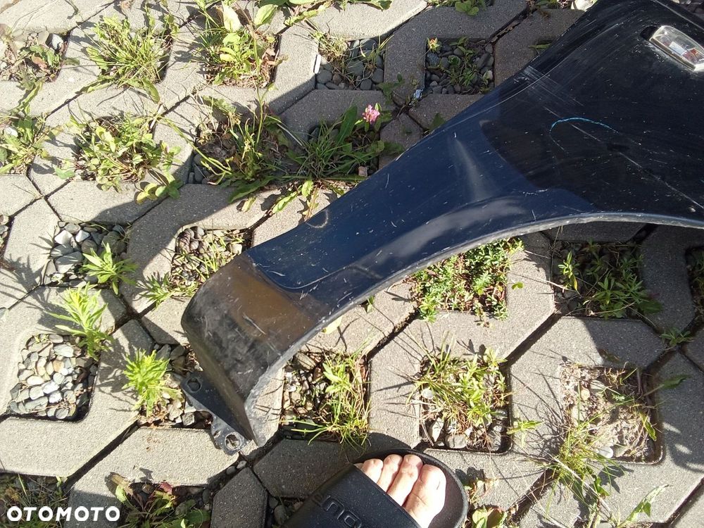 KL BŁOTNIK PRAWY PRZÓD OPEL CORSA D 06- 5D - 5