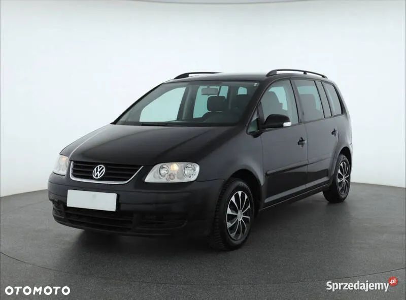 Błotnik VW TOURAN 03-2006 nowy PRAWY KOLOR LC9Z