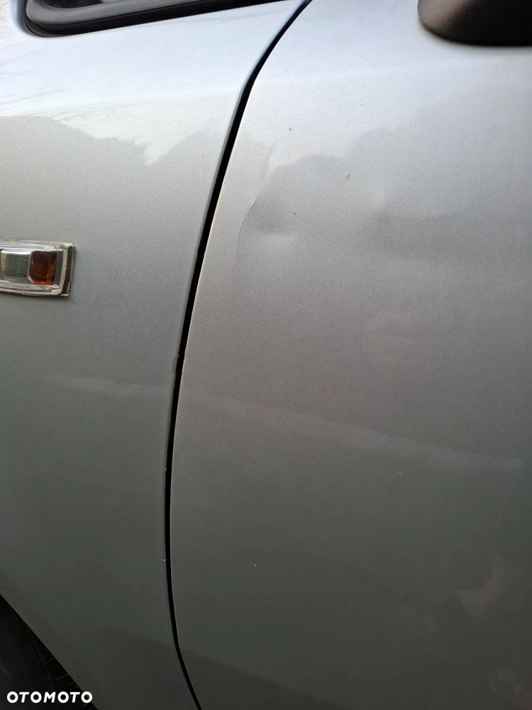 Opel Corsa 1.4 16V Cosmo - 7