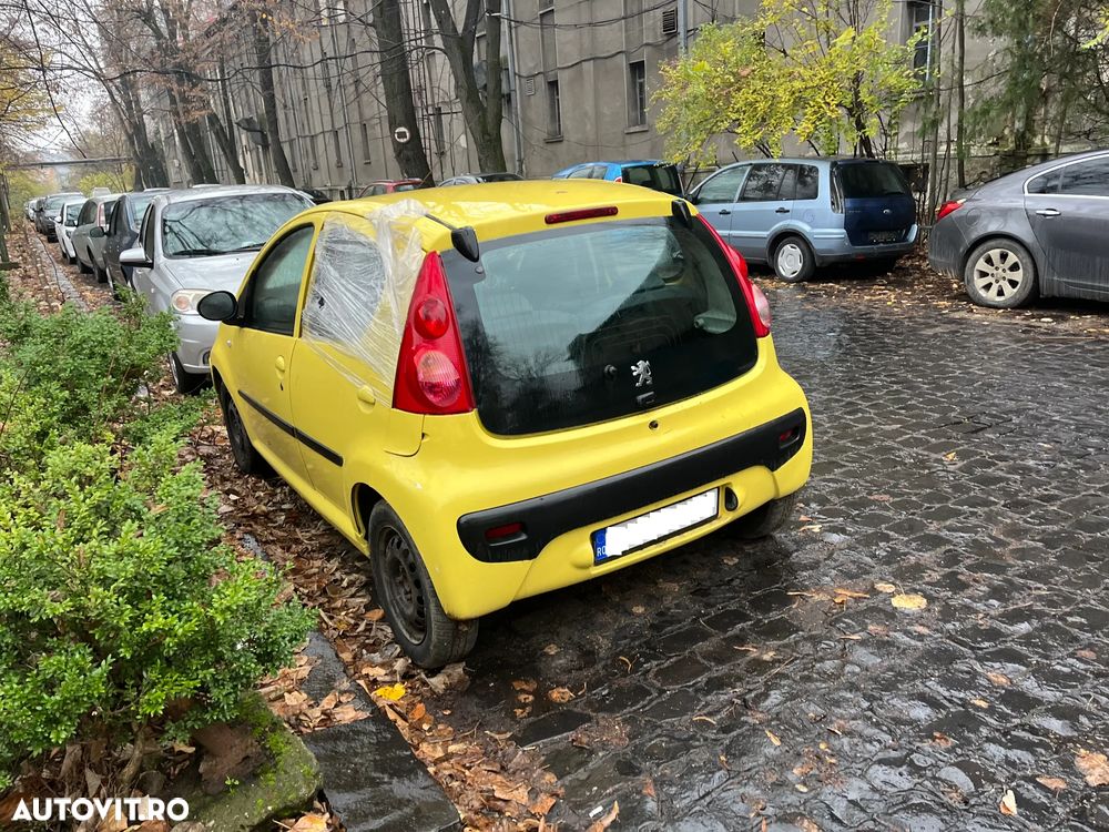 Dezmembrez Peugeot 107 1.0 benzina 2006 galben cu 4 usi - 11