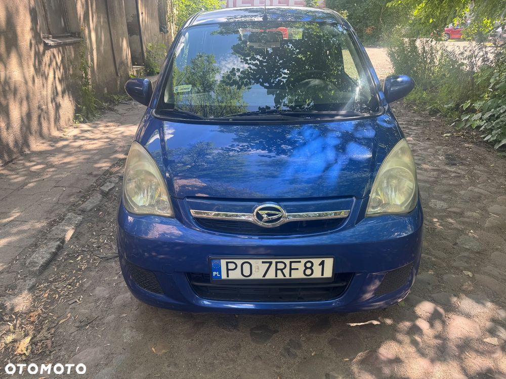 Daihatsu Cuore 1.0 Top - 1
