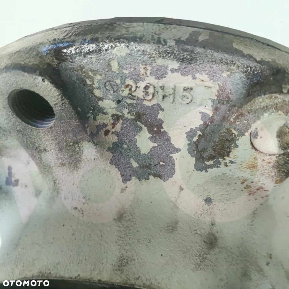 Zwrotnica 6194274M1 Zwolnica 85825032 Piasta 85825037 New Holland LB 115 - 18