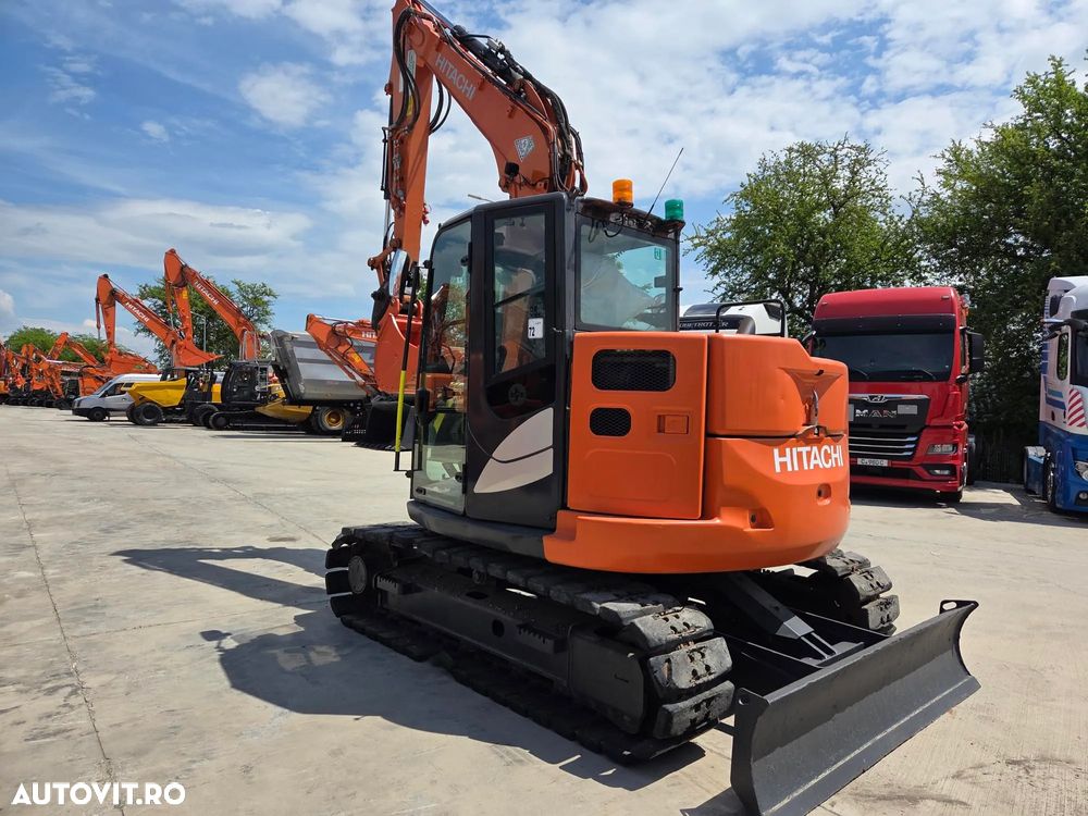 Hitachi ZX85-6, 2022, 2.491h, Masa operationala 8,6t, cupla rapida HIDRAULICA+3 CUPE NOI, senile paduri cauciuc, inst picon si inst rotire pe brate, ad sapare 5m, ridica 3,8t, aer cond, LAMA, STARE FOARTE BUNA, posibil leasing 4 ani-PROMOTIE 62.900 EUR+Tva - 2