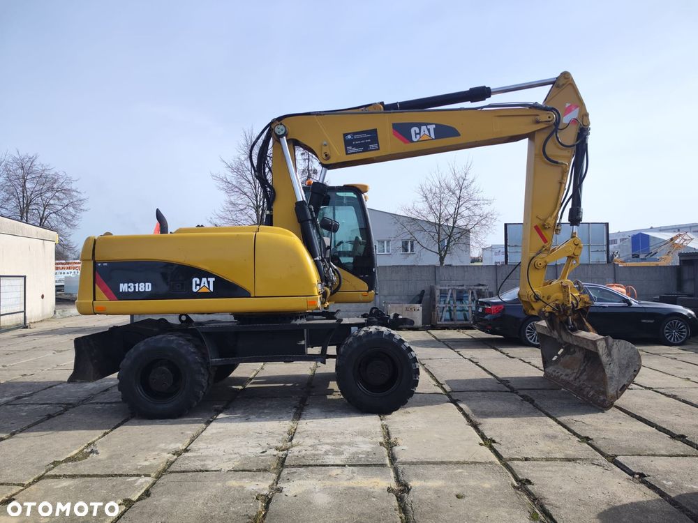Caterpillar 318D - 10