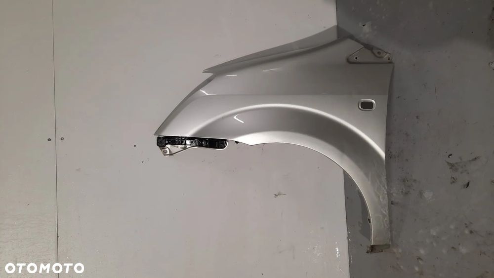 BŁOTNIK PRZÓD PRZEDNI LEWY COROLLA VERSO II 1C0 DO MALOWANIA - 1