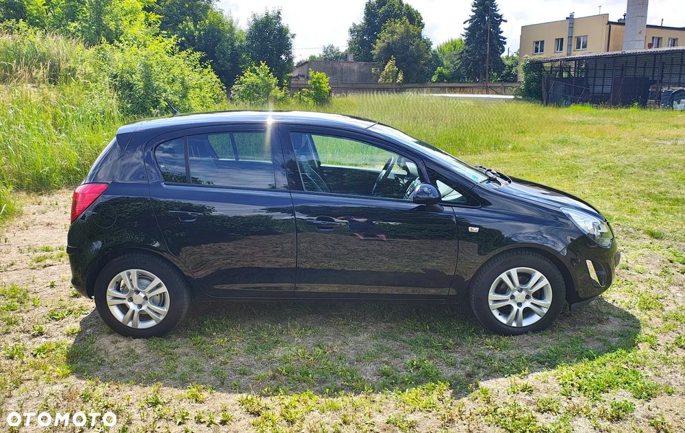 Opel Corsa 1.4 16V Cosmo - 11