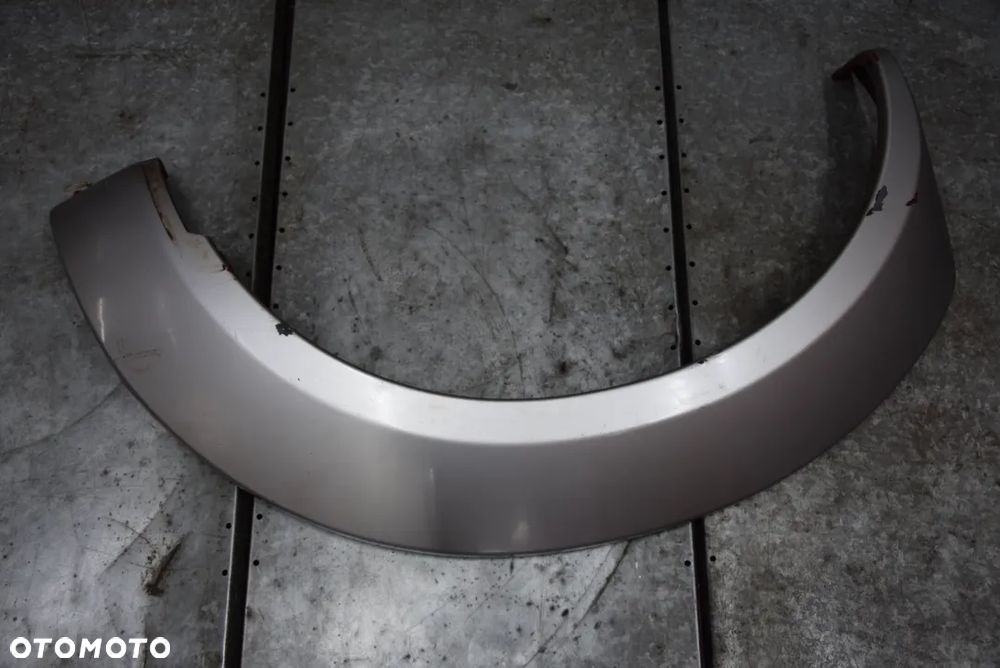 NISSAN NAVARA D22 LISTWA BŁOTNIKA LEWA  TYŁ 4D - 1