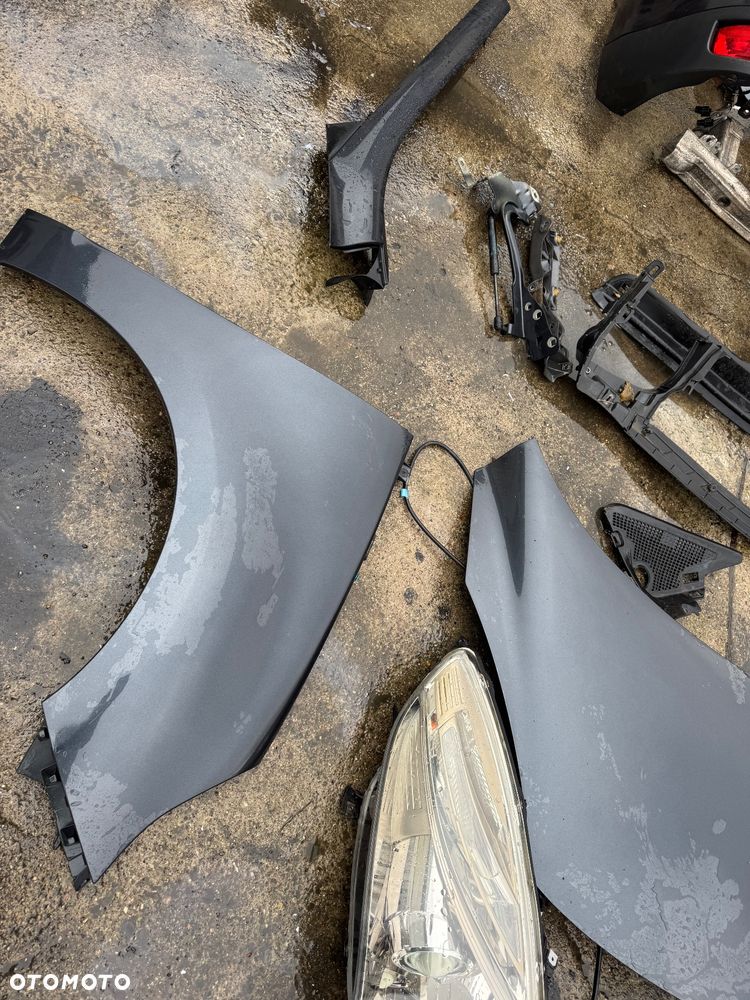 Renault grand scenic 3  grandscenic TEB66  / EA3 / Jz1V / TLALLE / SZHR / SAN513 // D22240 drzwi prawe lewe przednie tylne tył przód kompletny przód grand Scenic 3 szary ciemny drzwi prawe lewe lusterko składane zderzak tył tylni klapa bagażnika klapa tył lampy tył tylnie prawa lewa belka tylnia Podszybie kompletne osłoną słupka prawa lewa zawiasy maski prawy lewy wąż węże klimy podstawa akumulatora zbiorniczek spryskiwaczy filtr powietrza belka dolna przednia na dole zbiorniczek płynu chłodzącego  Lampa prawa lewa bixenon xenon 08120 /260100027r / 89902929  błotnik przód przedni prawy lewy maska pas przedni benzyna tce 130 benzyna zderzak przód przedni pdc 4 czujniki spryski Zenona komplet - 6