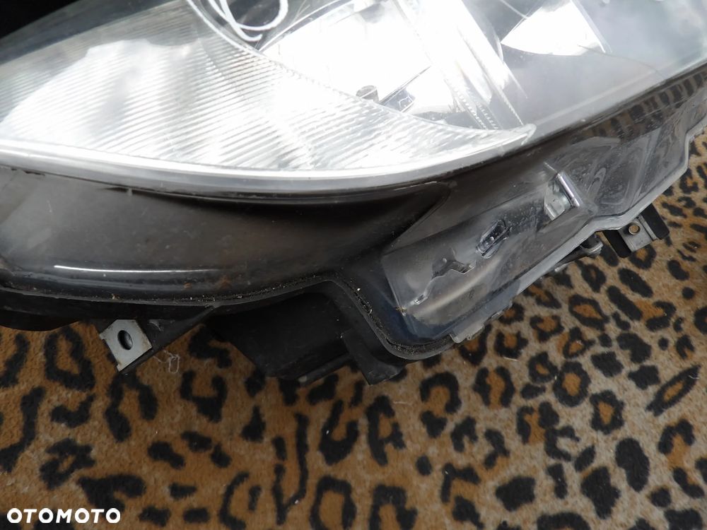 BMW - E93 - XENON - PRZED LIFT - PRAWA LAMPA PRZEDNIA - UK - 7162130 - 5