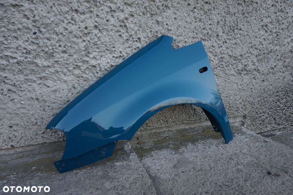 BŁOTNIK PRZEDNI LEWY VW CADDY III 04/10r LN6F - 1