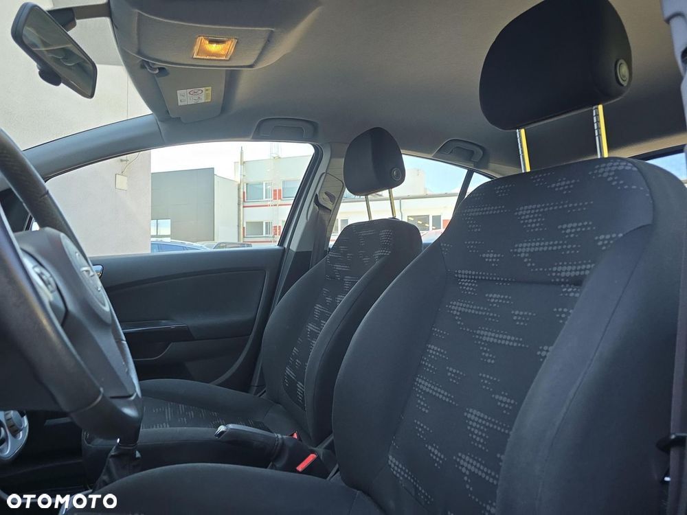 Opel Corsa 1.4 16V Enjoy - 17