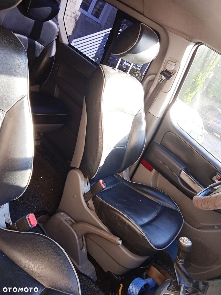 Na części Hyundai H1 II Wagon 2.5 CRDI 2010 lakier NBA silnik D4CBA skrzynia biegów GZ04 maska klapa drzwi przesuwne zderzak lampa błotnik fotel kanapa 7 miejsc szyba - 14