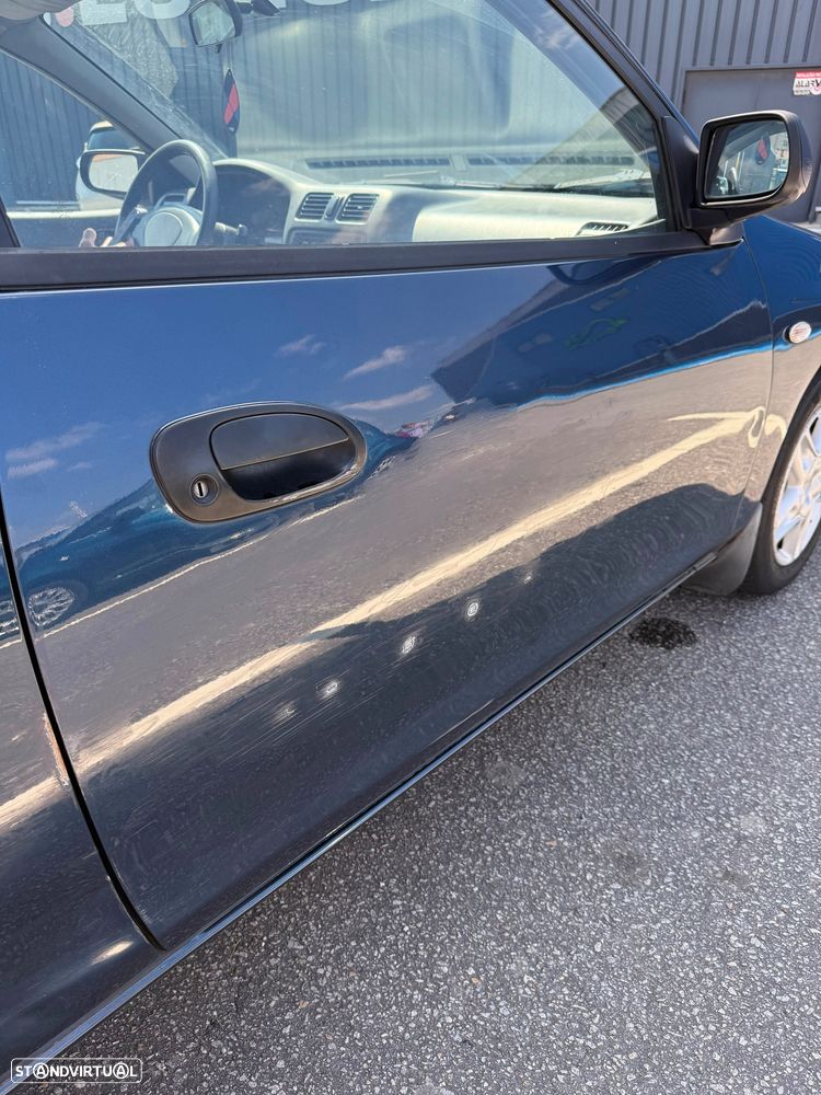 Mazda 323 P 1.3 - 13