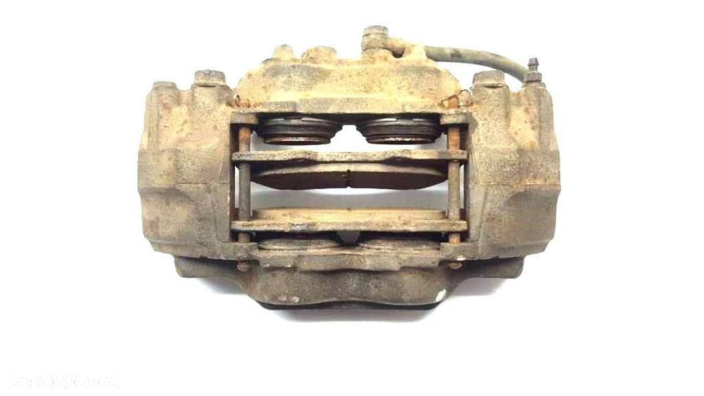 ZACISK PRZÓD PRAWY MITSUBISHI PAJERO IV 2007 EU - 1