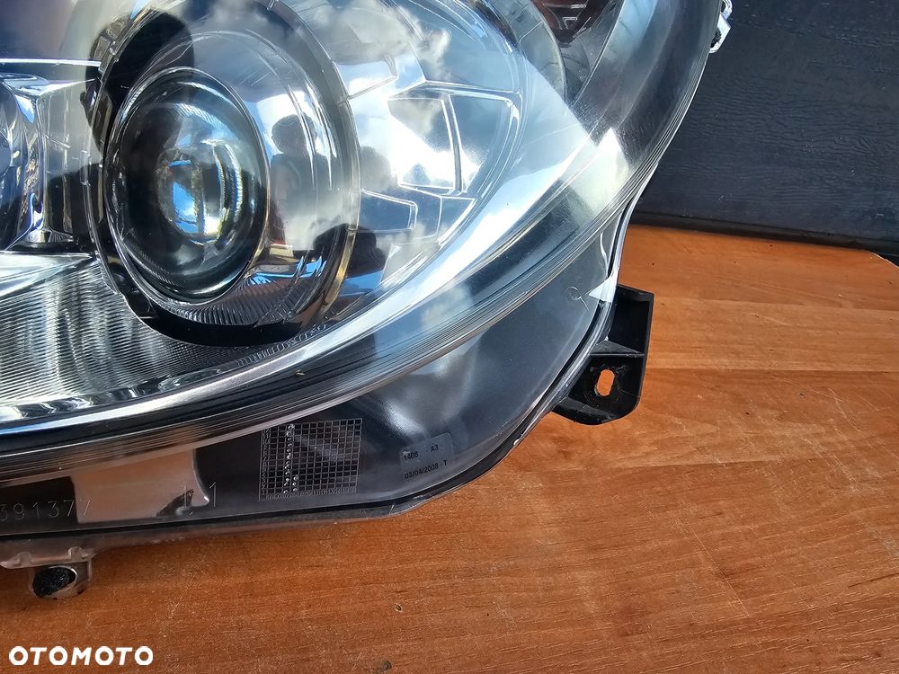 LAMPA SOCZEWKA LEWY PRZÓD LEWA PRZEDNIA OPEL CORSA D EUROPA 13186385 - 6