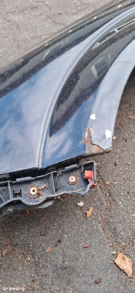 Blotnik lewy opel Astra H - 2