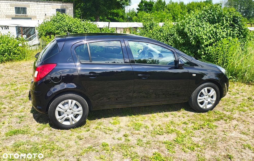 Opel Corsa 1.4 16V Cosmo - 10