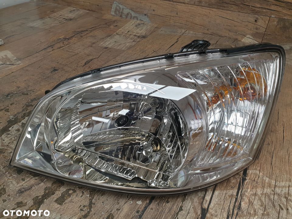 Oryginalna lampa lewa reflektor Hyundai Getz 92110-1C010 - 3