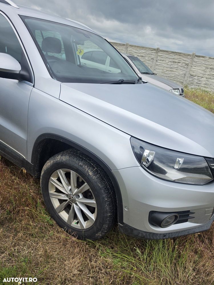 Fata completa  tiguan facelift  2011-2016  bara capota far trager - 1