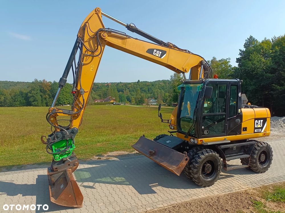 Caterpillar M313D - 13