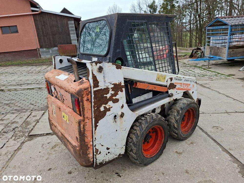 Bobcat 553 4X4 + Melroe Ingersoll-Rand 725S B/H - 5