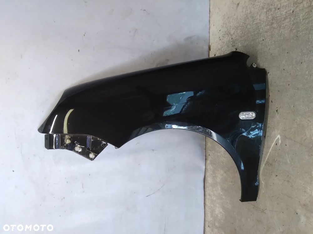 Błotnik LEWY PRZÓD PRZEDNI vw polo 9N OKULAR LC9Z CZARNY