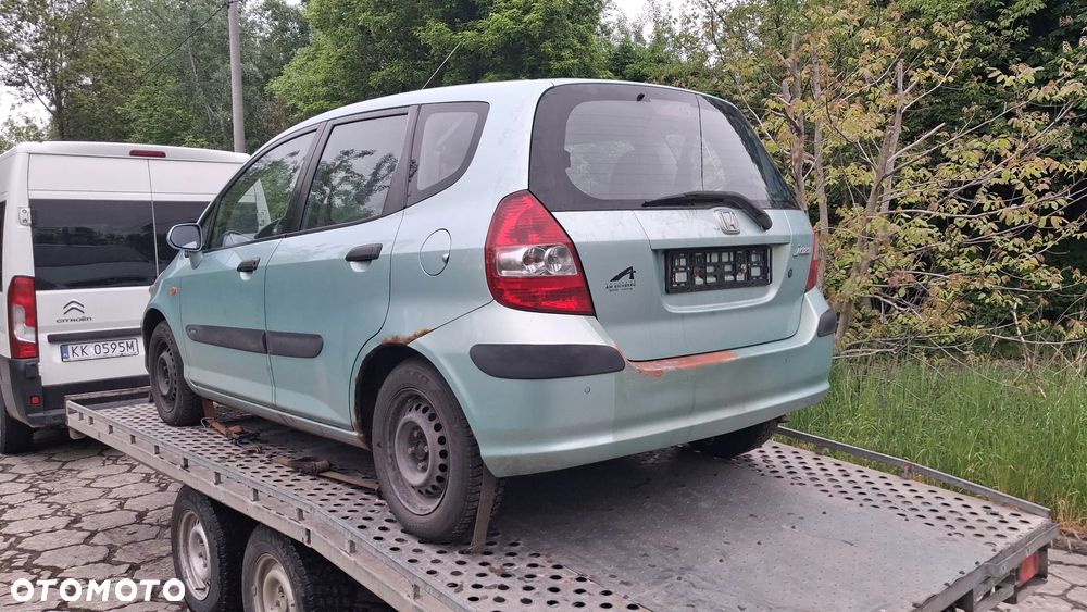 Na części Honda Jazz II Silnik 1.3 83KM L13A1 lakier G506M skrzynia automatyczna CVT maska zderzak drzwi klapa szyba fotel kanapa lusterko lampa deska GWARANCJA !!! Przód Tył Zestaw Komplet Drzwi Klapa Zderzak Błotnik Maska Grill Atrapa Szyba Pas Lampa Lusterko Boczki Fotel Kanapa Kokpit Deska Rozdzielcza Przełącznik Włącznik Sterownik Przewody Wiązka Instalacja Moduł Komputer Czujnik Listwa Pompa Alternator Wtryski Głowica Rozrusznik Kompresor Sprzęgło Dwumas Silnik Skrzynia ABS Klimatyzacji Paliwa Wspomagania Kolektor Turbina Przepustnica Zawór Chłodnica Koło Hak Belka Sanki Zawieszenie Mcpherson Półoś Amortyzator Wydech Tłumik Zacisk - 3