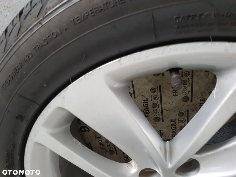 KOŁA CAŁOROCZNE OPEL MOKKA TRAX  5X105  7JX18  215/55R18  215/55/18 - 11