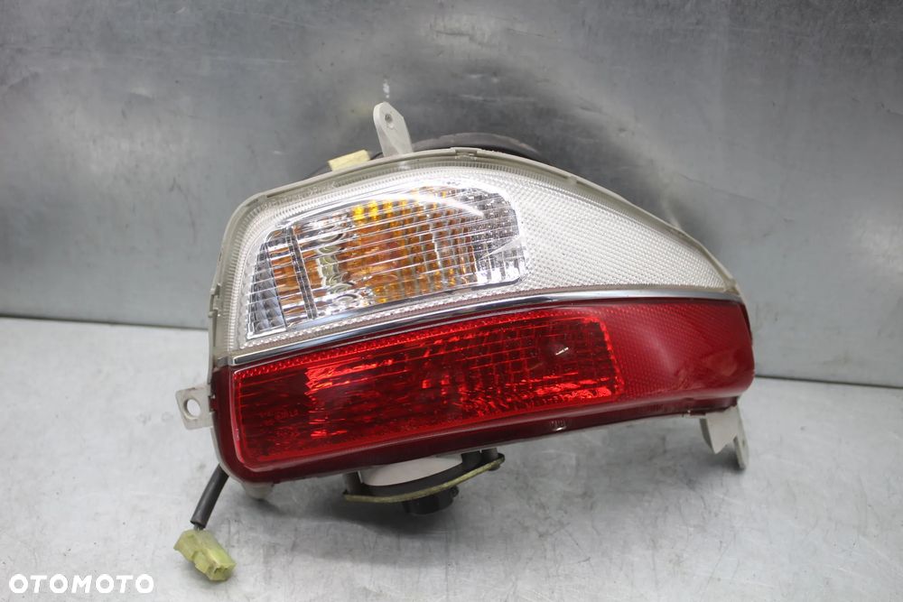 Suzuki Burgman AN 650 Executive 06r K6 K7 ABS EXE Lampa tył prawa tylna