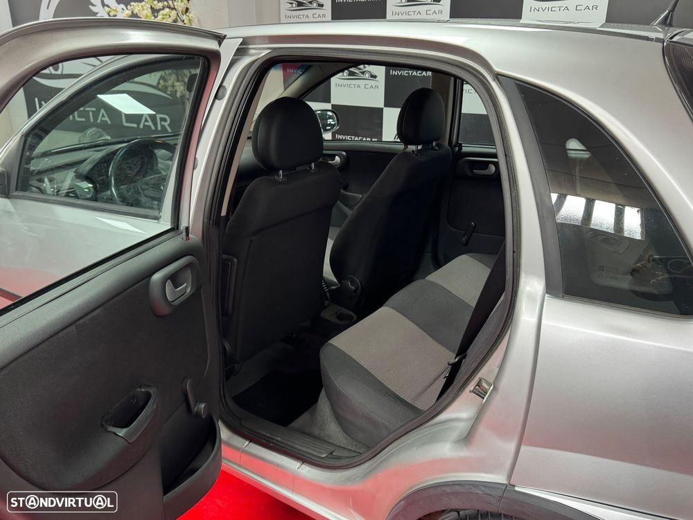Opel Corsa 1.2 Twinport Cosmo - 31