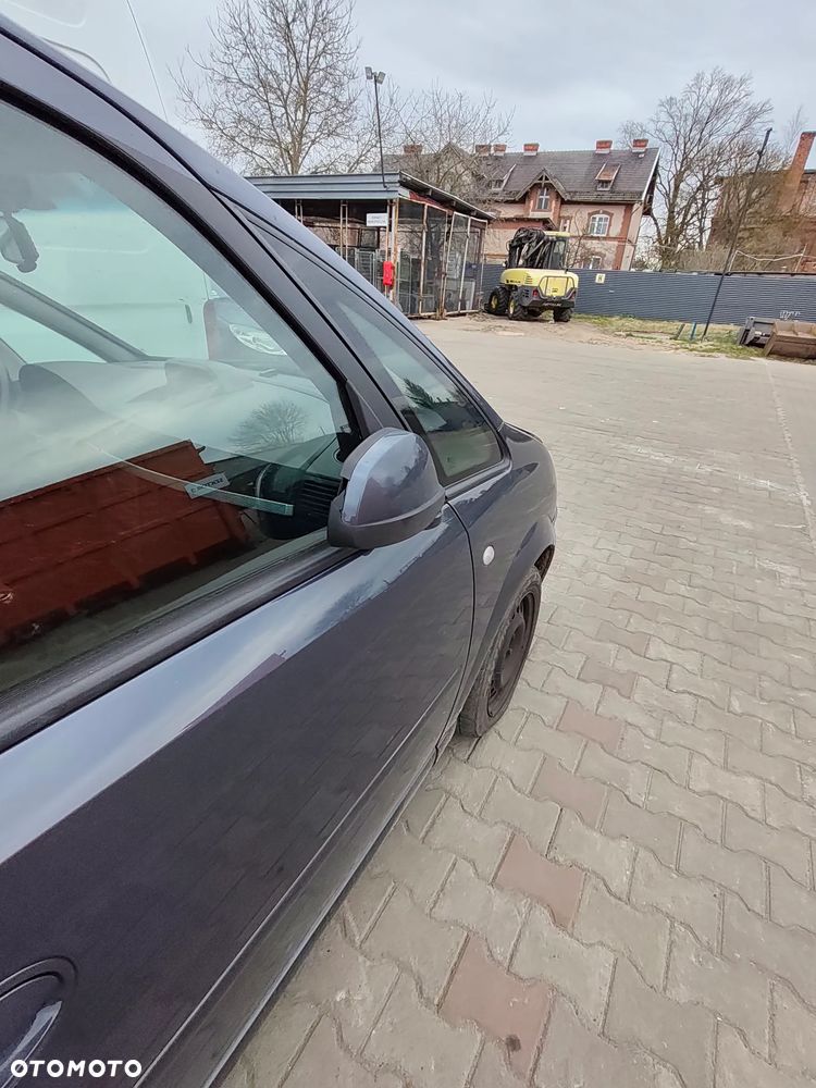 opel meriva A na części fotel drzwi szyby lusterko skrzynia chłodnica zamek klamka radio - 7