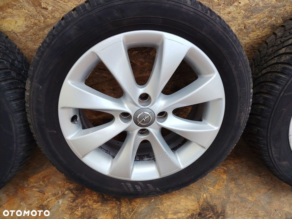 OPEL 6,5JX16H2 4X100 ET42 fi 57,1mm FELGI ALUMINIOWE KOMPLET X4 205/55R16 6mm - 5