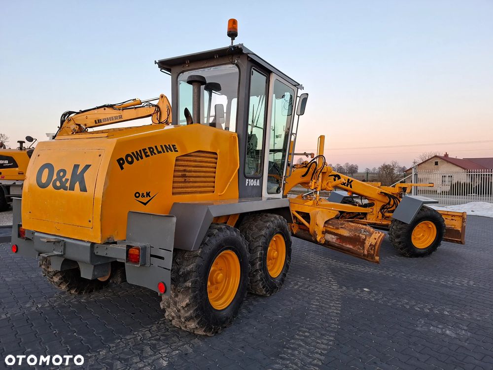 O&K F106A Równiarka Drogowa / New Holland / - 1