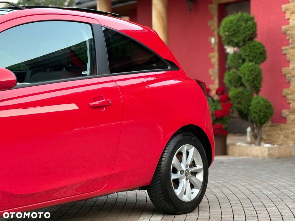 Opel Corsa 1.4 16V Cosmo - 11