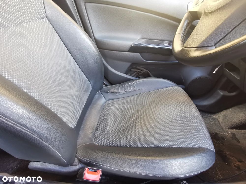 Opel Corsa 1.4 16V Enjoy - 23