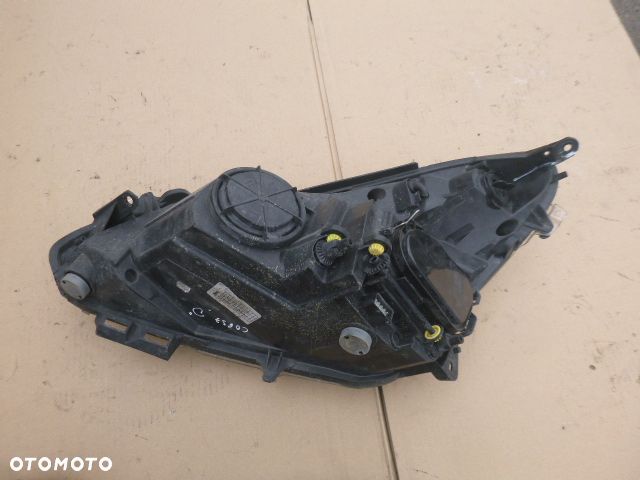 LAMPA PRAWY PRZÓD PRAWA PRZEDNIA OPEL CORSA D 06-11 - 23