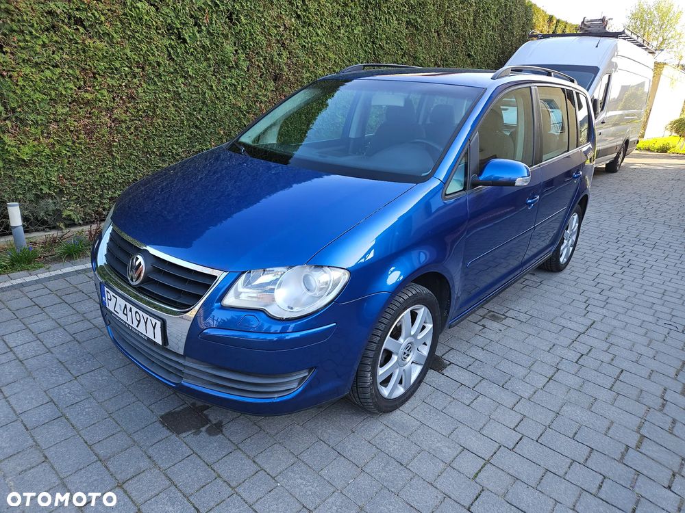 Volkswagen Touran 1.4 TSI Conceptline DSG - 1