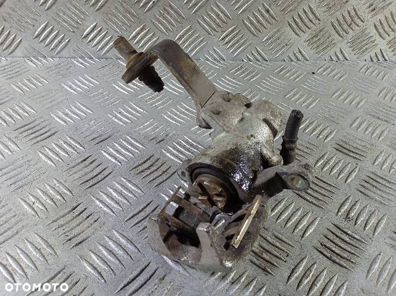 ZACISK LEWY TYLNY HONDA JAZZ 2 - 2