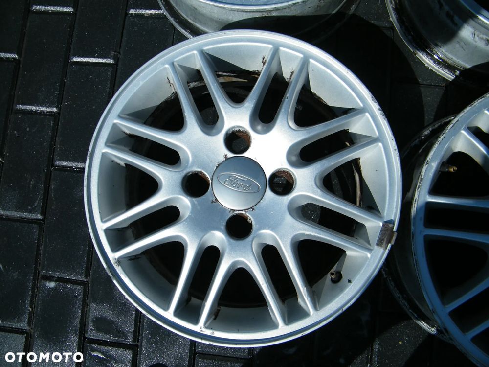 Felgi aluminiowe alufelgi komplet 4x108 ET52,5/ 6J x 15 otwór 62 - 4