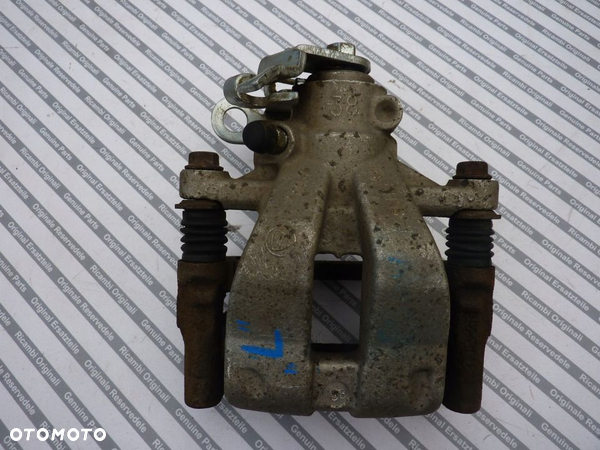 FIAT BRAVO II ZACISK HAMULCOWY LEWY TYŁ 38
