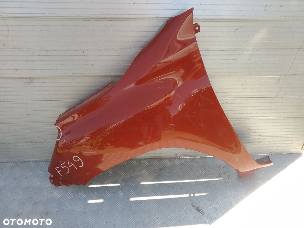 F549 LEWY BŁOTNIK TOYOTA HILUX 2016- - 1