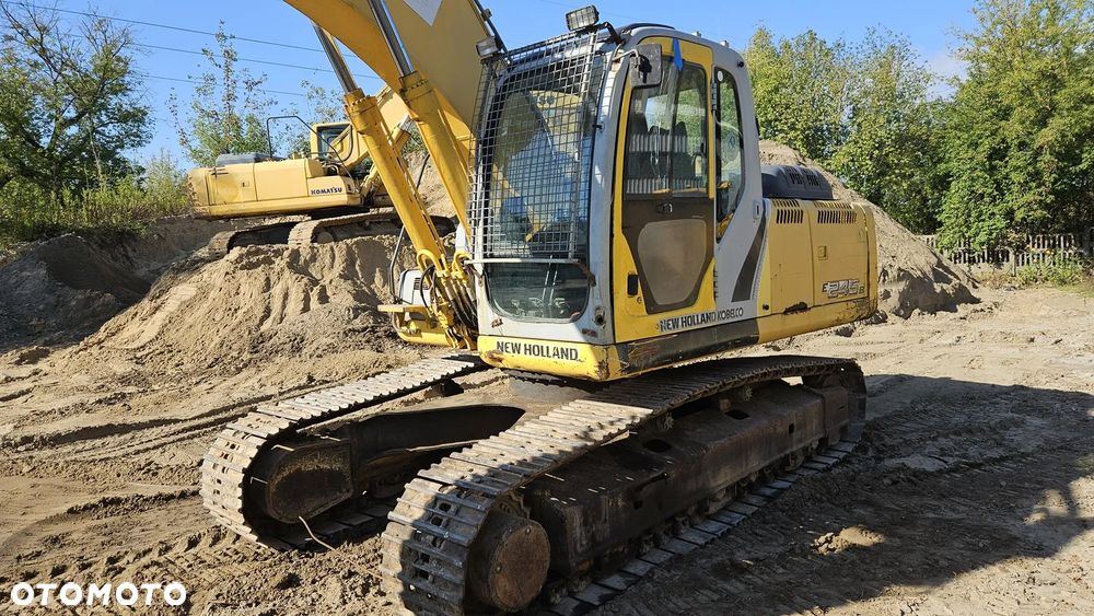 New Holland E 245 B - 9