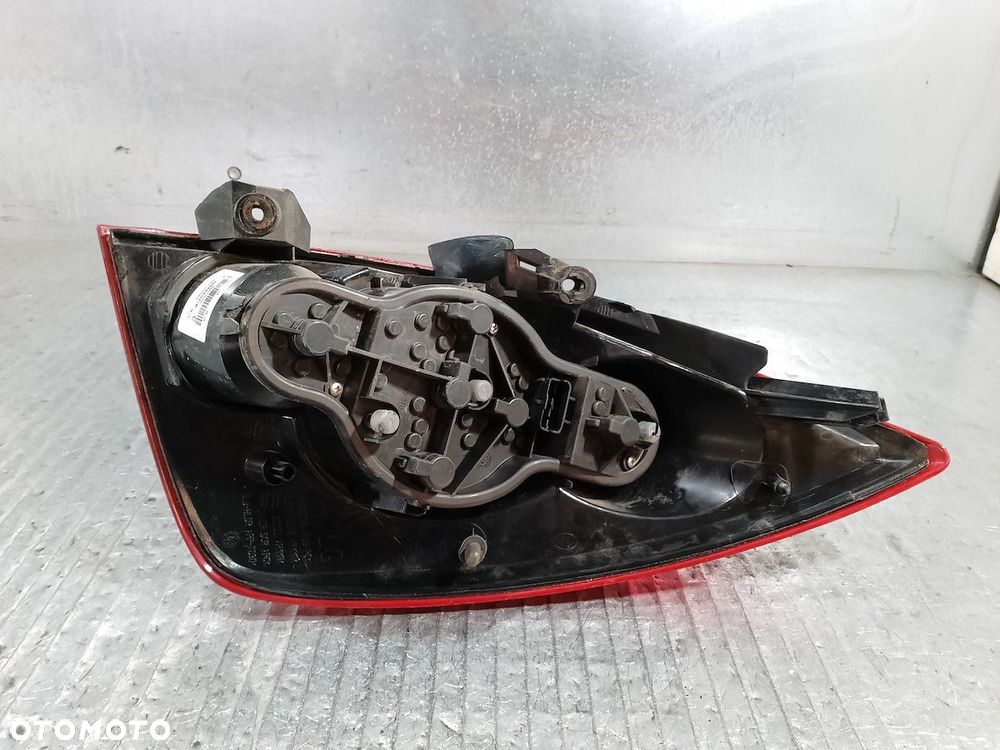 LAMPA TYLNA LEWA NISSAN PRIMERA P12 ( 03-07 ) 89077070 26555AU21B KOMBI - 4