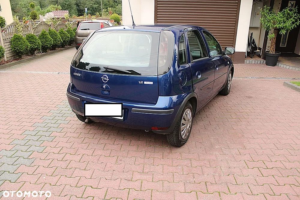 Opel Corsa 1.2 16V Cosmo - 5