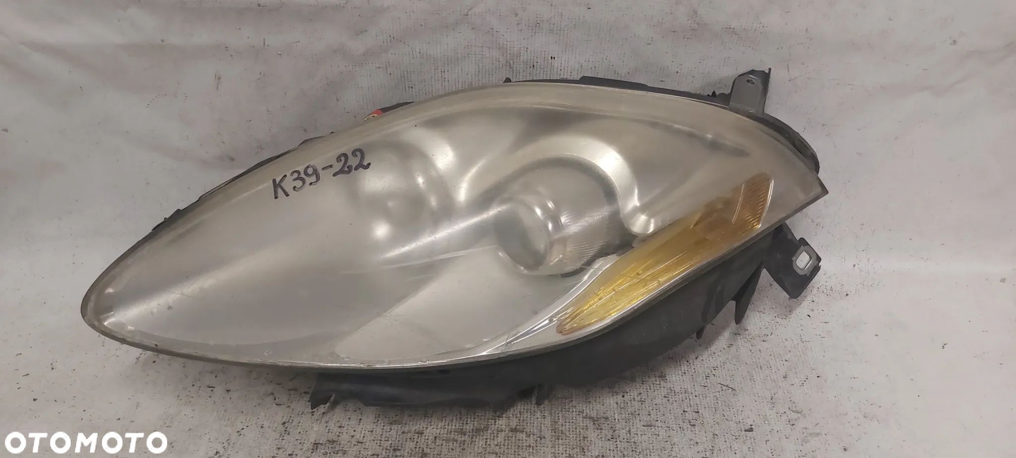 .  PRZOD PRZEDNIA LAMPA LEWA FIAT BRAVO 2 - 1